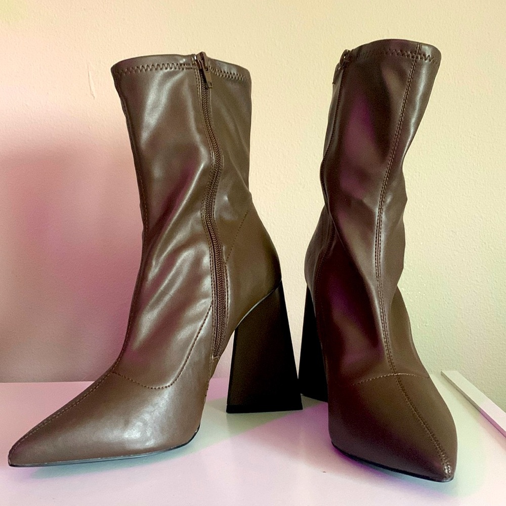 Chucky heeled boots. Never been worn!